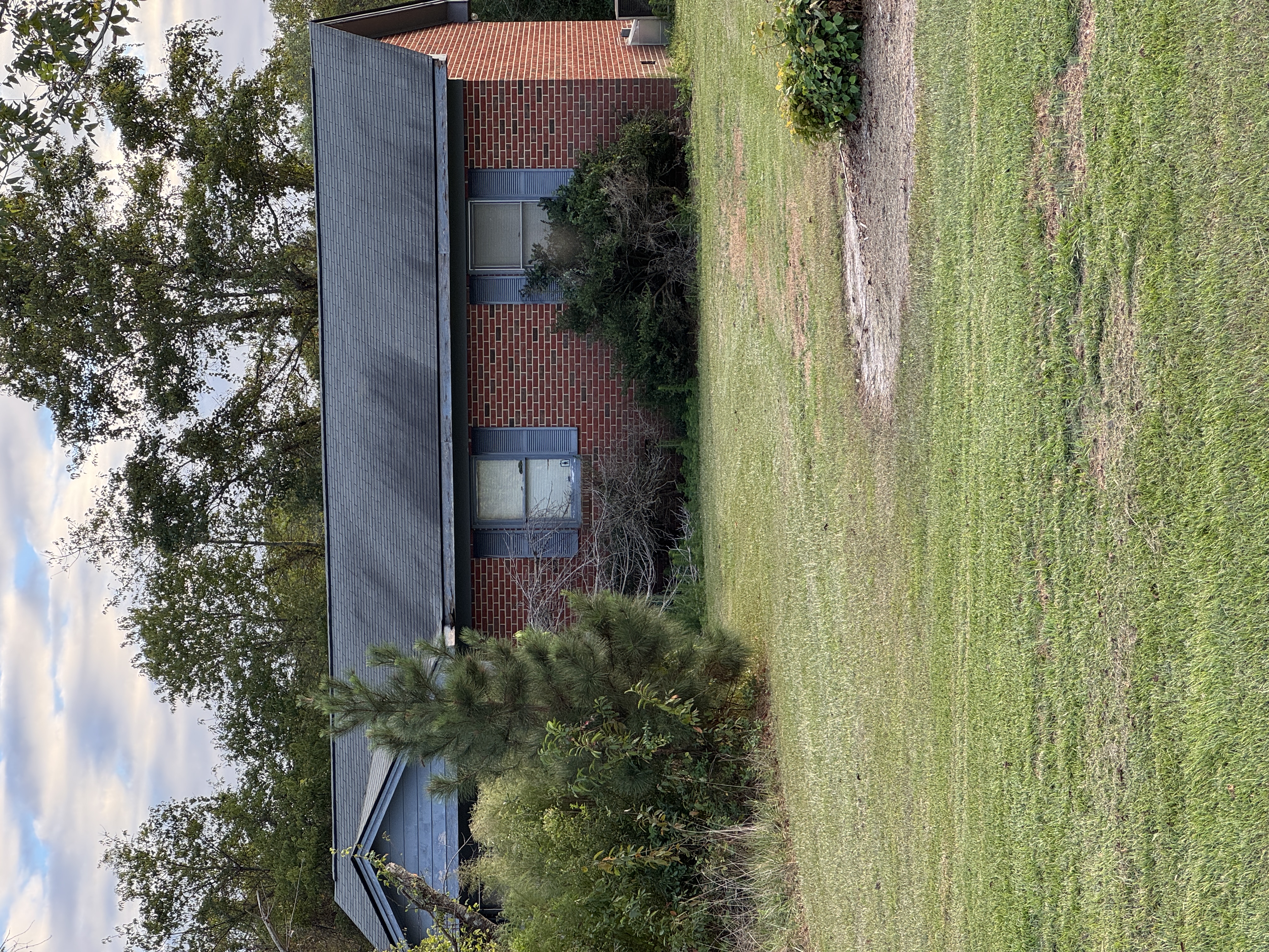 Front view of a brick investment property in Eastern North Carolina.